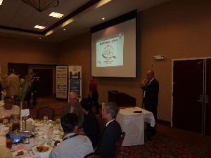 Dave Hart, chapter president, introduces the chapter's conference, InfoTech 2010, to the August luncheon audience.